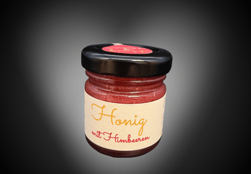Honig mit Himbeeren
